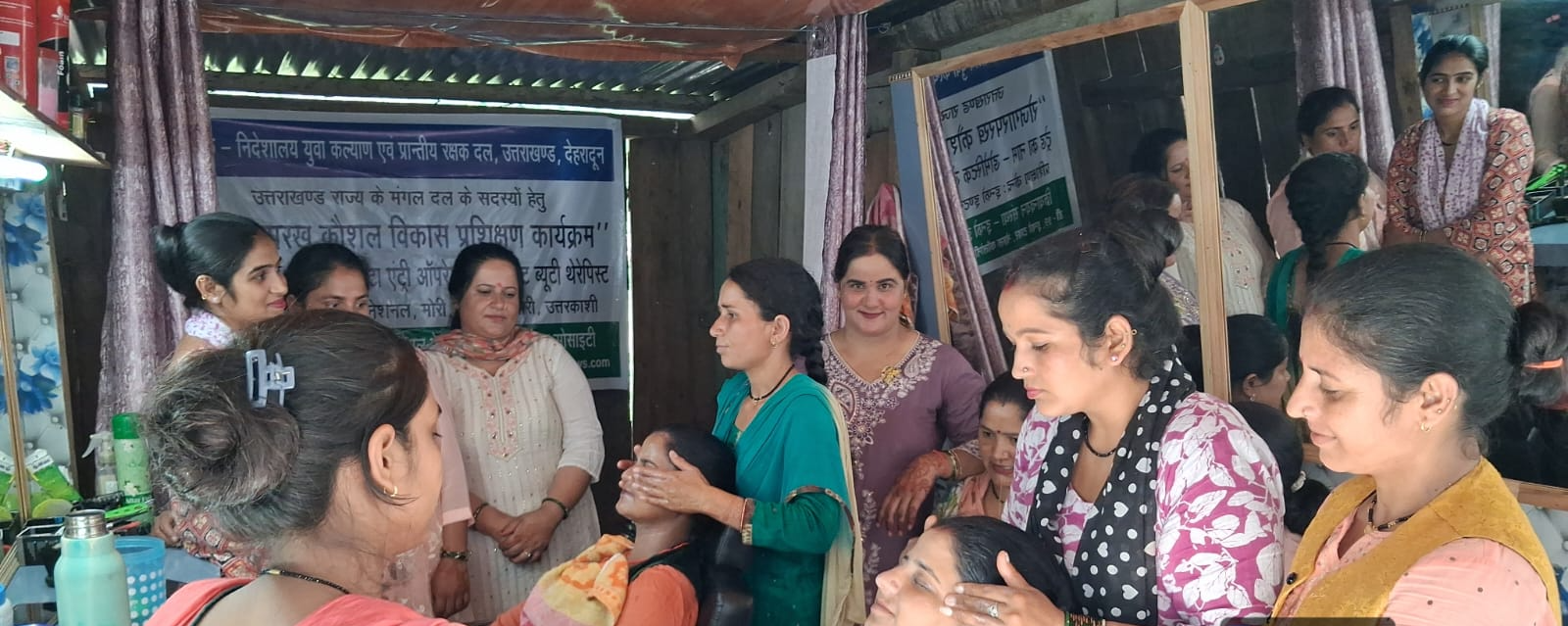 Beauty therapist trainees practising during a session in Mori, Uttarkashi