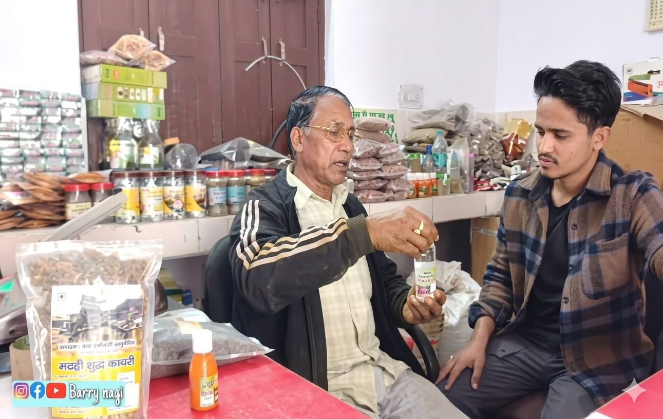 A producer at the Bhilangana Valley Producer Company demonstrating herbal products under the Bharadi brand